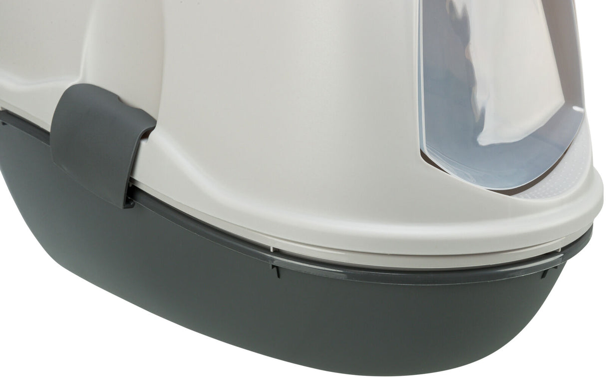 Geschlossene Katzentoilette mit klarer Tür aus grauem und weißem Kunststoff, links Draufsicht.