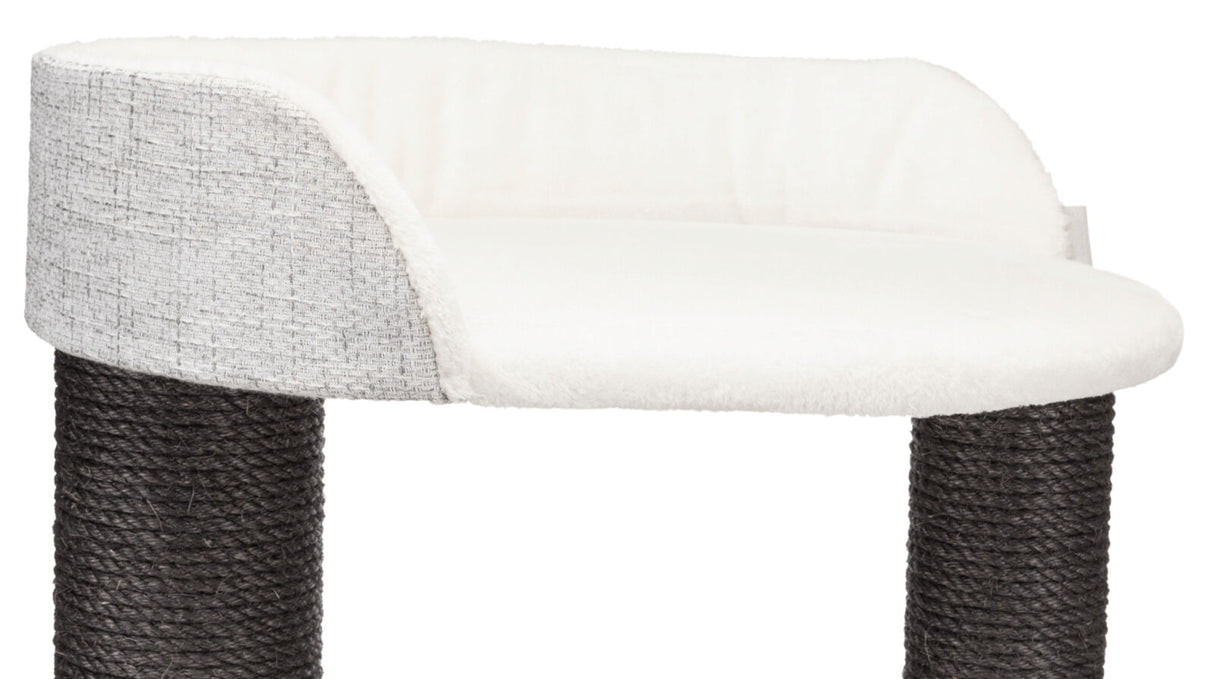 Kratzmöbel mit runder weißer Liegefläche und grauem Rand auf dunklen, mit Seil umwickelten Säulen.