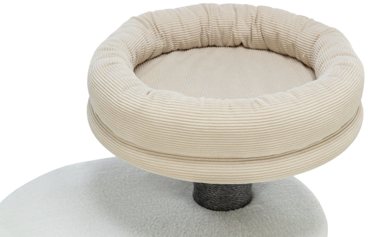 Rundes, beige gepolstertes Möbelstück mit geripptem Stoff und dunklem Stützpfeiler darunter.