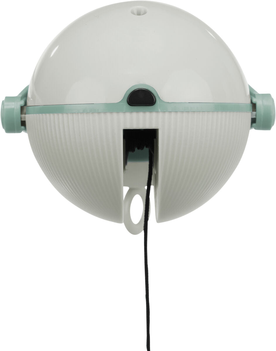 Weiße, halbkugelförmige Vorrichtung mit türkisfarbenen Akzenten und herausragender schwarzer Schnur.