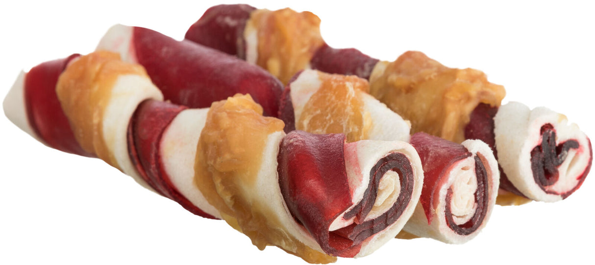 Verschiedene rot-weiße Kaustangen mit braunen Verzierungen, eng aufeinander liegend.