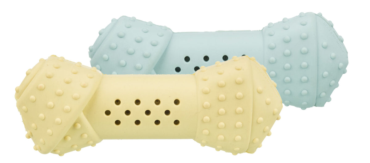 Zwei stachelige Spielzeuge in Pastellfarben Gelb und Blau, jeweils in Knochenform mit Löchern.