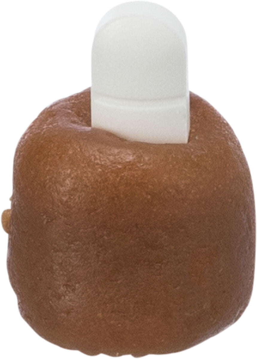 Brauner, unförmiger Gegenstand mit einem weißen, abgerundeten Teil an der Oberseite, vor neutralem Hintergrund.