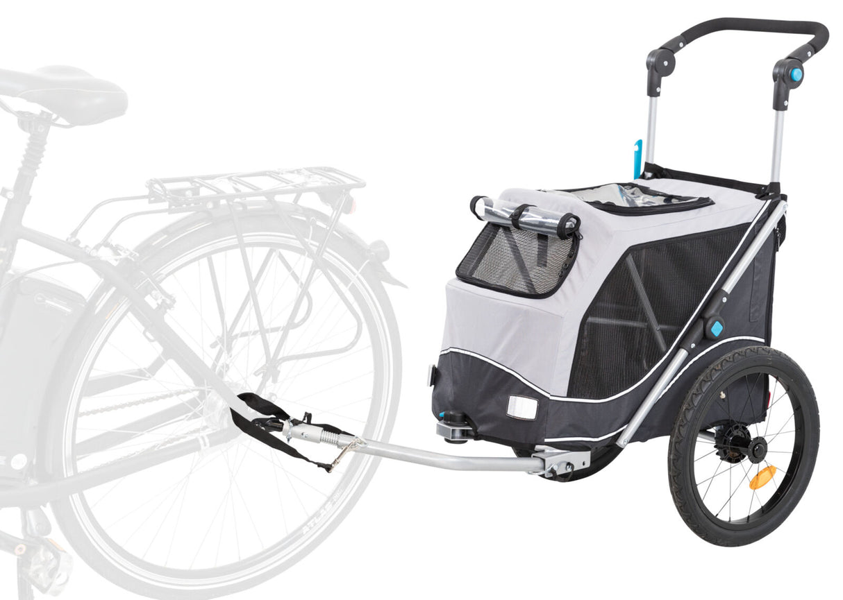 Fahrradanhänger mit zwei Rädern, grauem Stoff, Fenster aus Netzmaterial und Verbindungsstange zum Fahrrad.