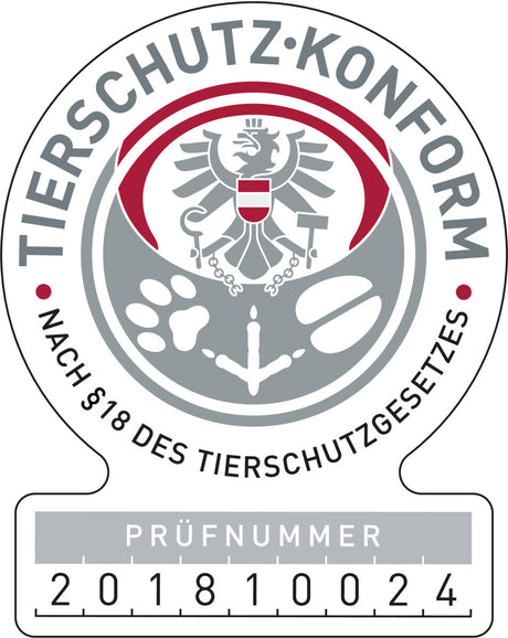 Rundes Siegel mit Adler und Pfotenabdrücken, Text "TIERSCHUTZKONFORM" und Prüfnummer 201810024.