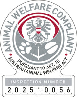 Rundes Siegel mit Adler und Pfotenabdrücken, Text: "Animal Welfare Compliant", "Pursuant to Art. 18 Austrian Animal Welfare Act", "Inspection Number 202510056".