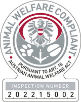 Abzeichen mit Adler-Emblem, Schriftzug "ANIMAL WELFARE COMPLIANT" und Inspektionsnummer 202215002.