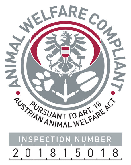 Tierwohl-Logo mit österreichischem Wappen, Text "Animal Welfare Compliant", "Pursuant to Art. 18 Austrian Animal Welfare Act", Inspektionsnummer 201815018.