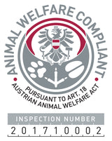 Rundes Siegel mit Adler, Pfotenabdrücken, Kette und dem Text: "Animal Welfare Compliant, Austrian Animal Welfare Act".
