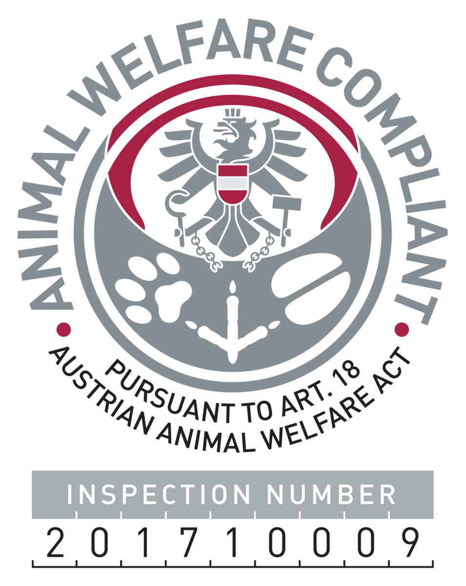 Siegel mit Adler, Text "Animal Welfare Compliant", "Pursuant to Art. 18 Austrian Animal Welfare Act", Prüfziffer 201710009.