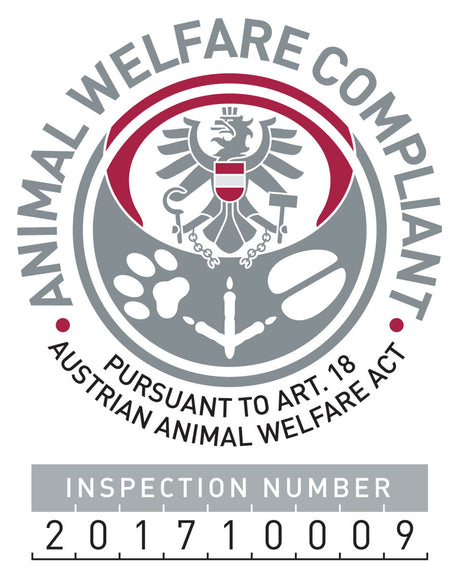 Siegel mit Adler, Text "Animal Welfare Compliant", "Pursuant to Art. 18 Austrian Animal Welfare Act", Prüfziffer 201710009.