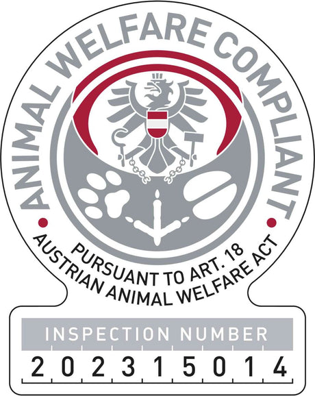 Das Bild zeigt ein Siegel mit einem Adler und einem Wappen, Text "ANIMAL WELFARE COMPLIANT" und "202315014".