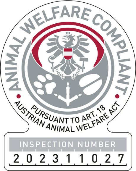 Rundes Siegel mit Adler, Text "Animal Welfare Compliant" und "Pursuant to Art. 18 Austrian Animal Welfare Act", Inspektionsnummer 202311027.