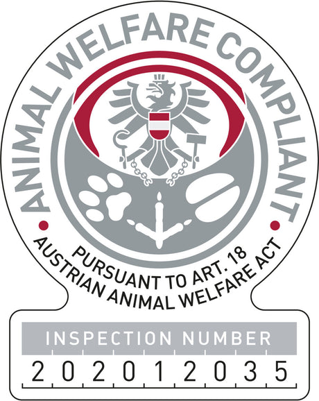 Rundes Siegel mit Adler und Text: "Animal Welfare Compliant" und "Pursuant to Art. 18 Austrian Animal Welfare Act".