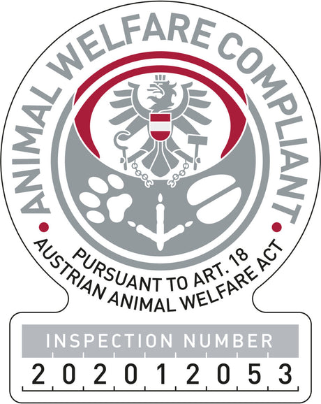 Emblem mit Adler, Tierpfoten, Schriftzug "Animal Welfare Compliant," Gesetzesverweis, Inspektionsnummer 202012053.