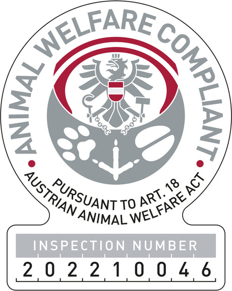 Siegel mit Adler und Schriftzug "ANIMAL WELFARE COMPLIANT" und "PURSUANT TO ART. 18 AUSTRIAN ANIMAL WELFARE ACT".