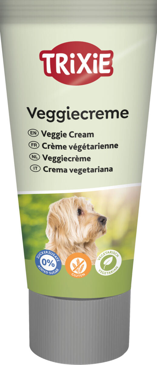 Eine beige Tube mit rot-weißem "TRIXIE"-Logo und schwarzem Schriftzug "Veggiecreme" über einem Hundebild.