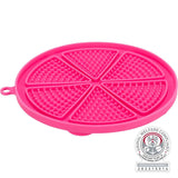 Runde pinke Matte mit sechs dreieckigen Feldern, Noppen und einem kleinen Haken an der Seite.