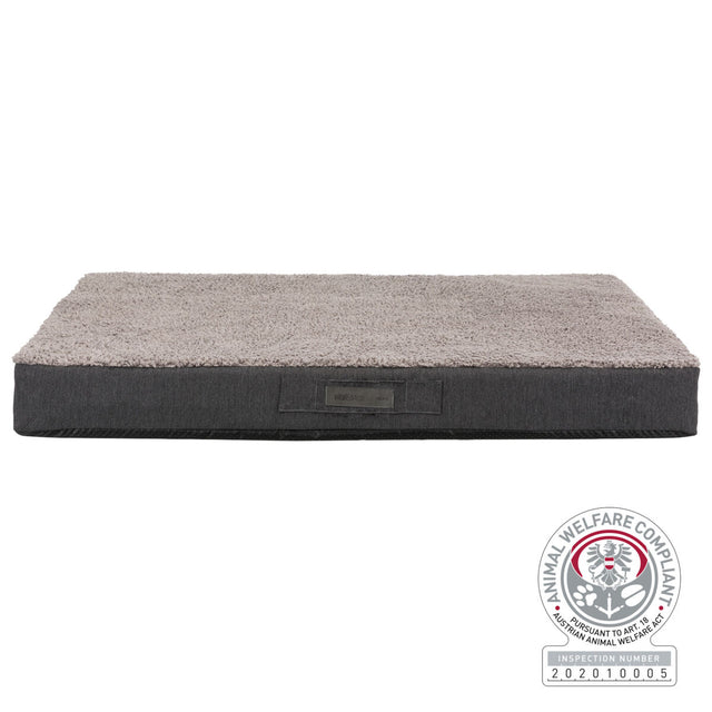 Rechteckiges, graues Tierbett mit weicher Oberfläche und sichtbarem „Animal Welfare Compliant“-Zertifikat.
