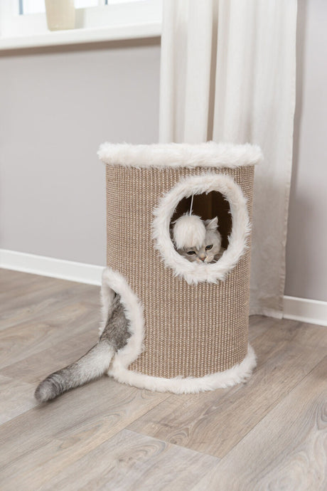 Katzenhöhle aus beigem Material mit weißen Plüschkanten, eine Katze schaut aus einem runden Fenster.