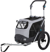Grauer Fahrradanhänger mit schwarzem Netzstoff, zwei großen Rädern, verstellbarem Griff und Befestigungsstange.