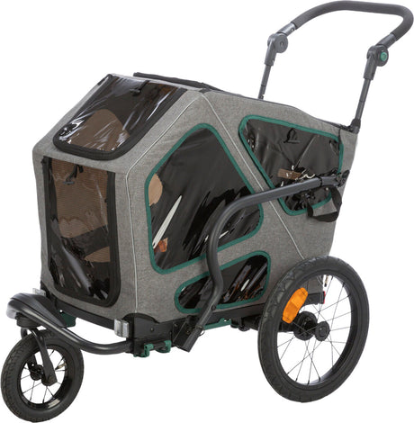 Dreirädriger Fahrradanhänger in Grau mit schwarzen und grünen Details, transparenten Fenstern und Griff zum Schieben.