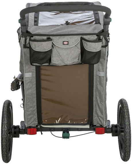 Fahrradanhänger in Grau mit zwei großen Rädern, mehreren Taschen an der Rückseite und transparentem Fenster oben.