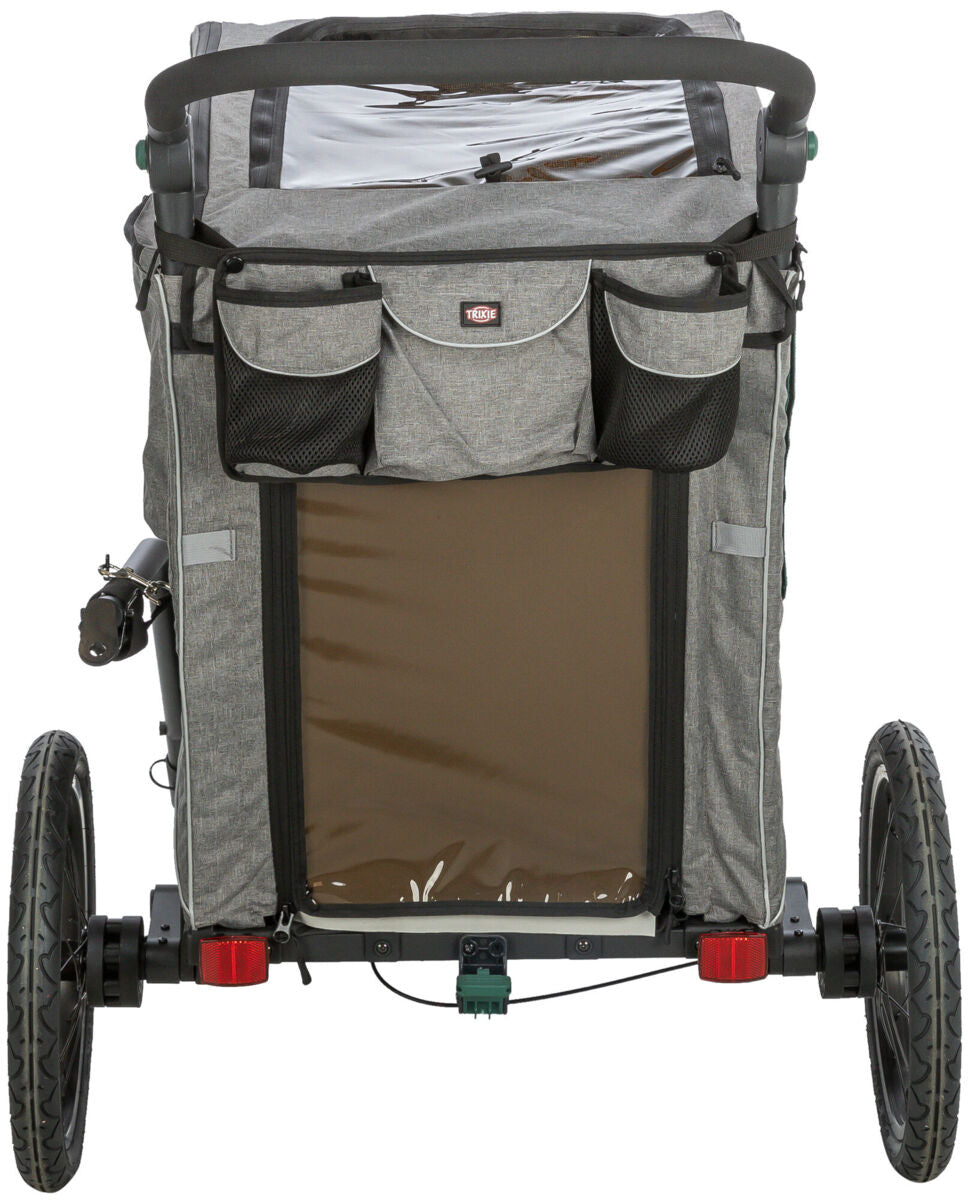 Fahrradanhänger in Grau mit zwei großen Rädern, mehreren Taschen an der Rückseite und transparentem Fenster oben.