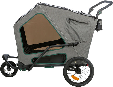 Grauer Fahrradanhänger mit drei Rädern, transparenten Fenstern und Reißverschlusstasche auf der Seite.