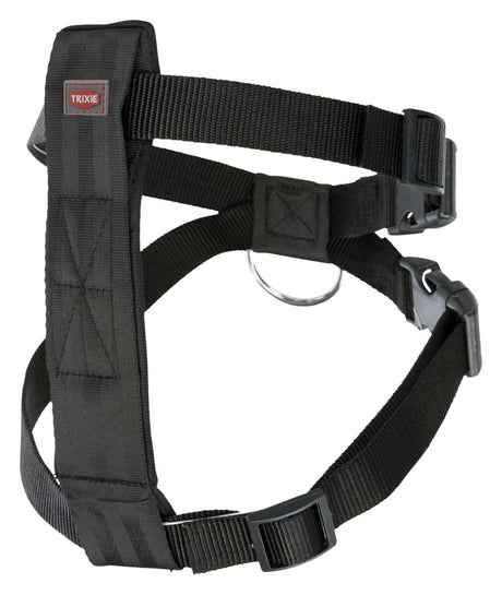 Schwarzes Hundegeschirr mit verstellbaren Riemen und silbernem D-Ring, Label "Trixie" sichtbar.