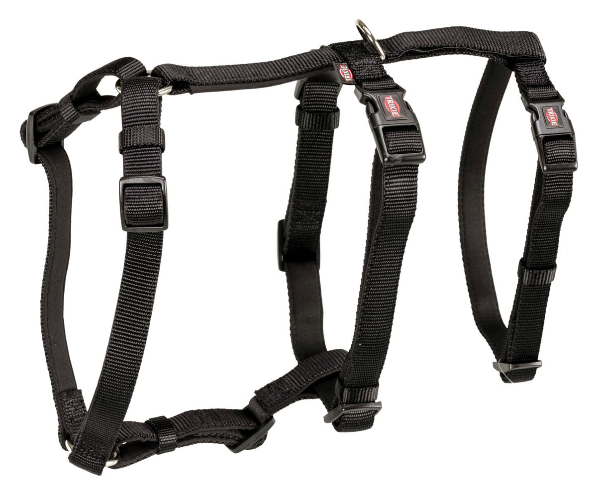 Ein schwarzes, verstellbares Hundegeschirr aus robustem Material mit mehreren Schnallen und einem Metallring.