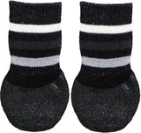 Zwei schwarz-weiß gestreifte Hundesocken mit rutschfester, strukturierter Sohle.