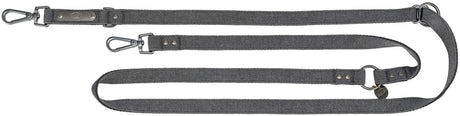 Lange graue Hundeleine mit zwei Karabinern und Metallöse aus robustem Material, Aufdruck "TRIXIE" sichtbar.