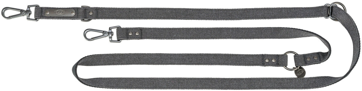 Lange graue Hundeleine mit zwei Karabinern und Metallöse aus robustem Material, Aufdruck "TRIXIE" sichtbar.