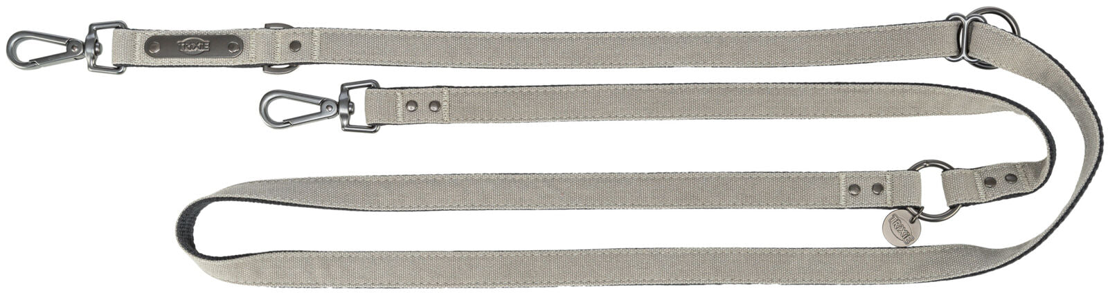 Beige Leine mit zwei Metallkarabinern und einem runden Anhänger, der Text "TRIXIE" zeigt.