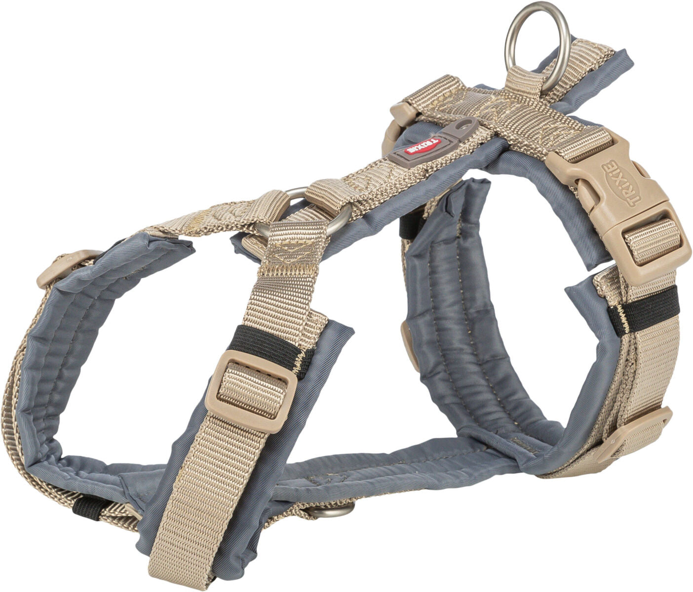 Beiges Hundegeschirr mit schwarzen Elementen und verstellbaren Riemen, D-Ring zur Befestigung sichtbar.