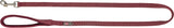 Rote Hundeleine mit gepolsterter Handschlaufe und Metallkarabiner, Text "TRIXIE" auf Etikett sichtbar.