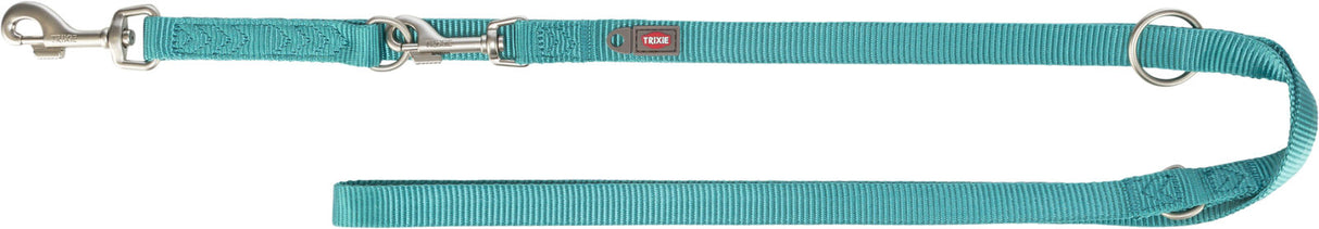 Türkise Hundeleine mit Metallhaken und Ringen, beschriftet mit "Trixie", aus robustem Material.