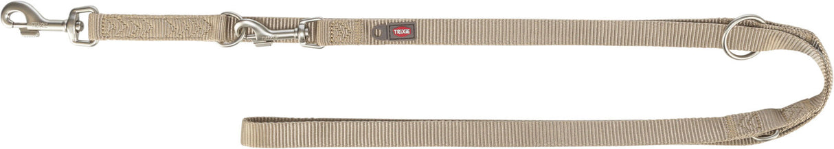 Beige Hundeleine mit Karabinerhaken und Schlaufe, Logo "Trixie" aufgedruckt, aus gewebtem Material.