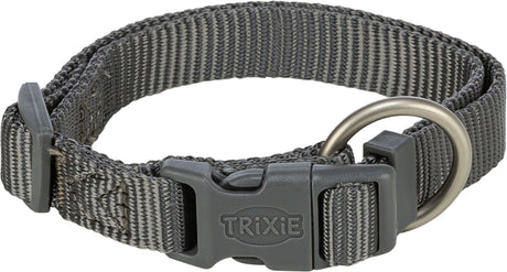 Graues, verstellbares Halsband für Hunde mit Kunststoffverschluss und metallischem D-Ring, Markenname „Trixie“.