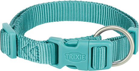 Türkisfarbenes Hundehalsband aus Nylon mit Klickverschluss und Metallring, Aufschrift "Trixie" sichtbar.