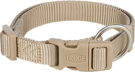 Beiges verstellbares Halsband mit Kunststoffschnalle und Metallring, Trxie-Logo auf der Schnalle.