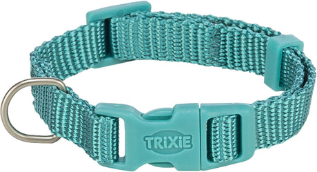 Türkisfarbenes Hundehalsband mit Klickverschluss, verstellbar und mit Metallring, der Text "TRIXIE" ist sichtbar.