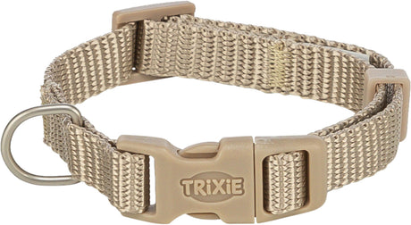Beige Hundehalsband mit verstellbarem Verschluss und Metallring, erkennbar mit der Aufschrift "Trixie".