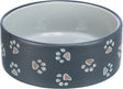 Grauer Napf mit aufgedruckten, blauen und braunen Pfotenabdrücken auf der Außenseite, innen weiß.