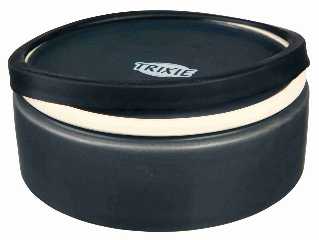 Runder, dunkler Behälter mit abnehmbarem Deckel und sichtbarem "Trixie"-Logo, kompakt und schlicht gestaltet.