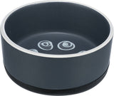 Grauer Futternapf mit weißem Rand und spiralförmigen Mustern innen auf dem Boden.