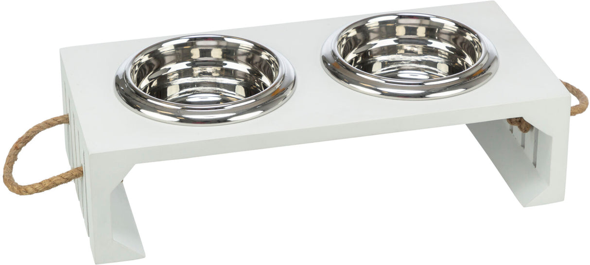 Doppelter Futternapf aus Edelstahl in einem weißen Holzgestell mit seitlichen Seilgriffen.