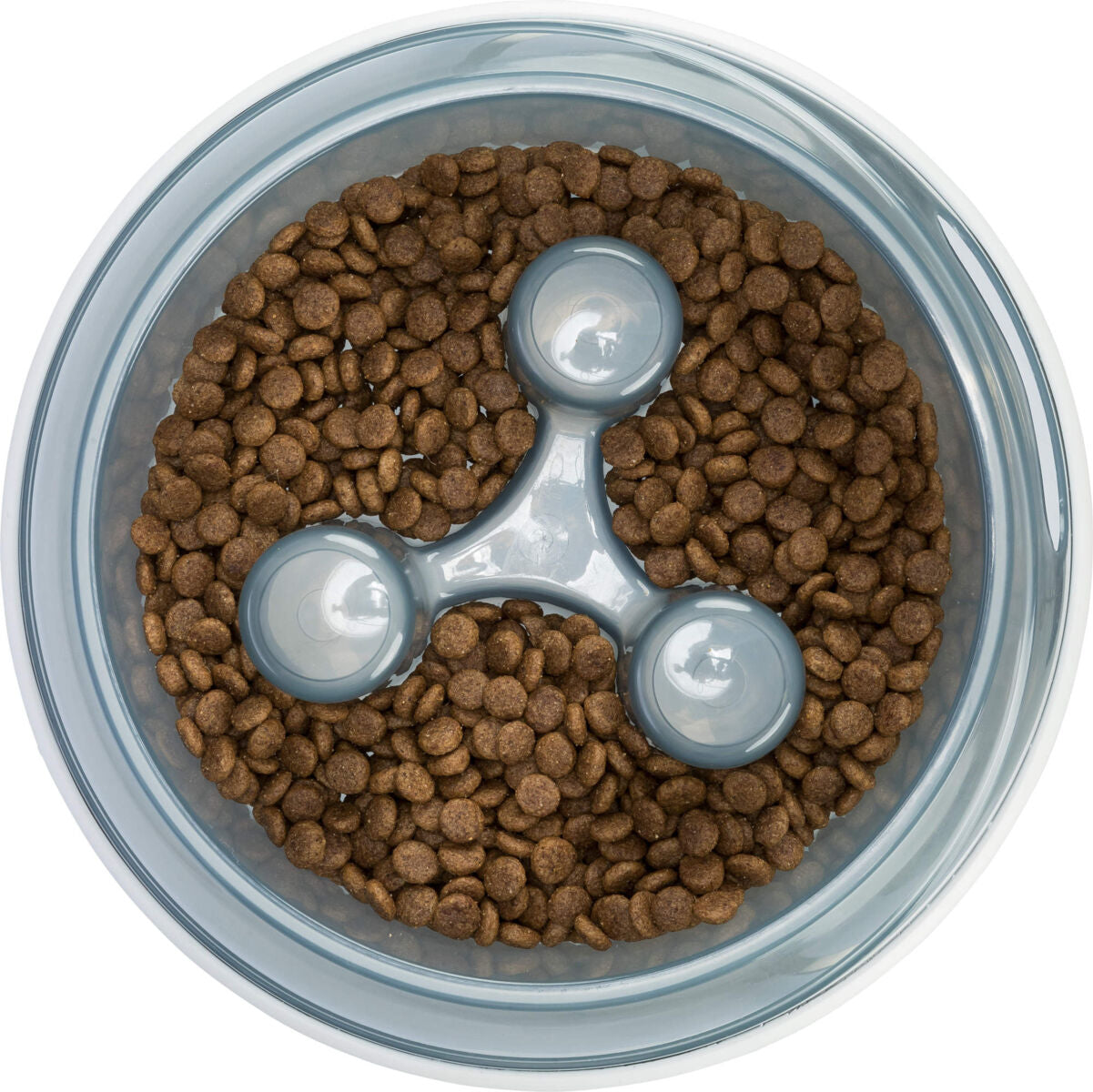 Runde, durchsichtige Schale mit braunen Trockenfutterstücken und einem dreiförmigen grauen Einsatz in der Mitte.