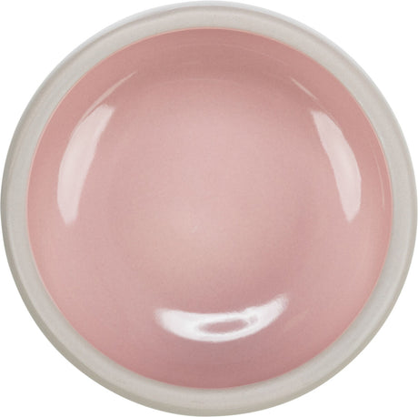 Runde Schale mit glänzender rosa Innenfläche und weißem Rand.